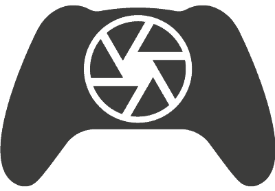 Icône noire de manette de jeu avec objectif de caméra au centre.